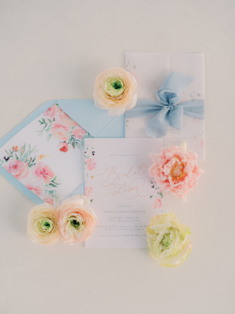 Bridal brunch invitation suite with complimenting ranunculus blooms
